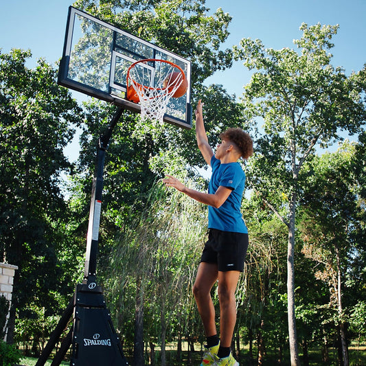 Spalding Portable Basketball System: Momentous Fast Assembly Outdoor Hoop